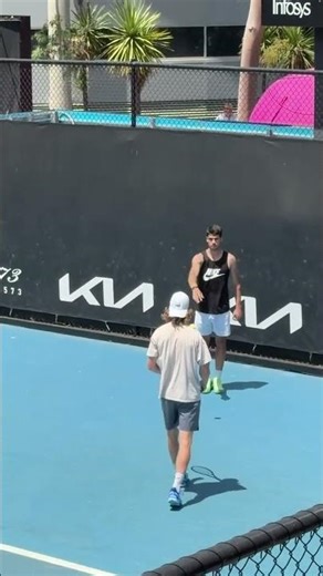 Carlos Alcaraz has found a part-time job as Andrey Rublev's ball boy 😅🎾 #tennis #ausopen