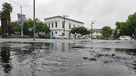 Two cars trapped under South Melbourne bridge during sudden flash flooding