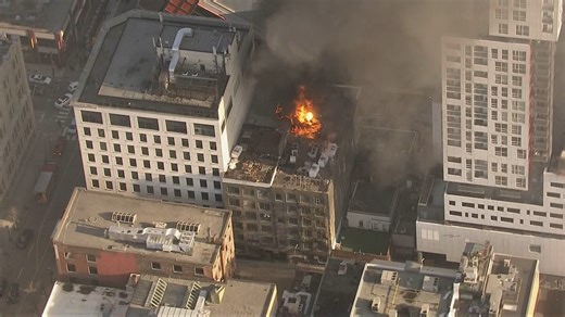 Crews knock down fire on roof of downtown Toronto building