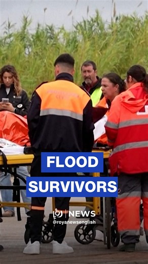 Flood survivors reach safety after heavy rain hits eastern Spain