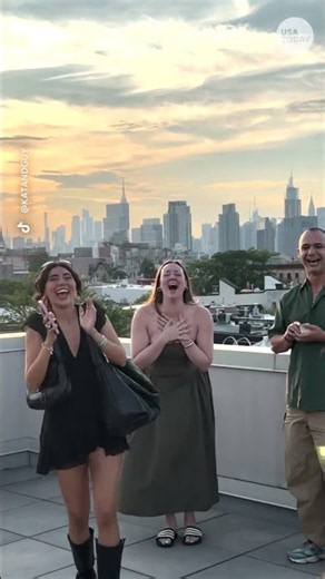 Nearly 40 people cram into stairwell to pull off proposal surprise