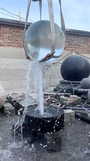 A Feng Shui spinning ball fountain, commonly known as a rolling sphere or floating sphere fountain, is a popular decorative water feature in traditional Chinese Feng Shui practice. It consists of a heavy spherical ball (typically made of marble, granite, stone, or crystal) that continuously rotates on a base, powered by water pressure from a pump. The flowing water and spinning motion symbolize the endless cycle of prosperity, wealth attraction ("rolling in riches"), and positive energy flow (Qi