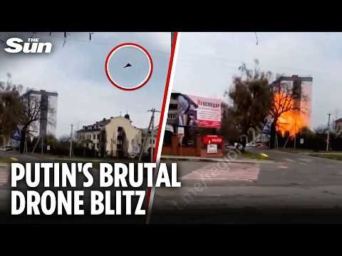 Shocking moment Russian kamikaze drone slams into residential building in Ukraine
