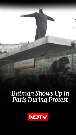 Batman Joins France Protests? Cost-Of-Living Rally Gets A Superhero Twist In Paris