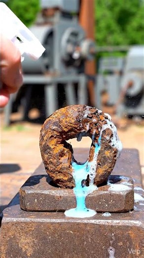 Watch Rust Dissolve from a Steel Locking Pin