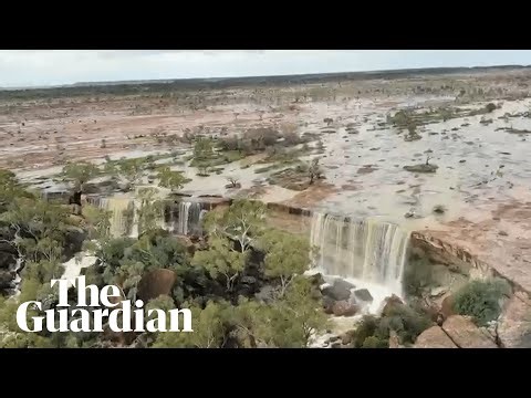 Spectacular waterfalls flow south of Winton after deluge of rain in outback Queensland