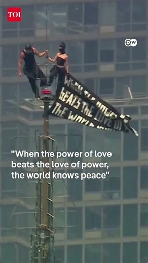 Russian Couple's Empire State Building Stunt Ends With Peace Message & Surprise Arrest
