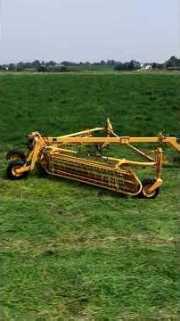 Raking alfalfa with the Vermeer R2800