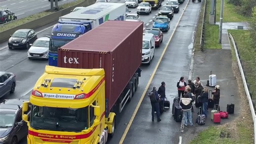 Irish fuel protests: People walk along motorway towards Dublin Airport as fuel protests continue