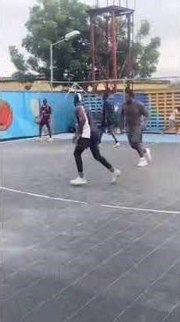 Intense Outdoor Three On Three Basketball Game On Urban Court