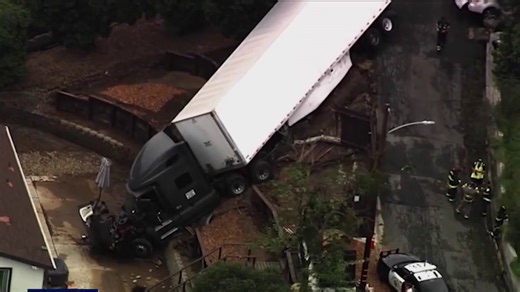 Semi-truck involved in Crockett crash, narrowly misses home