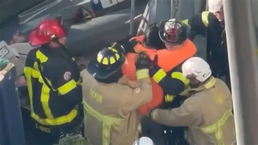 Video shows person being rescued from under construction equipment collapse in Miami