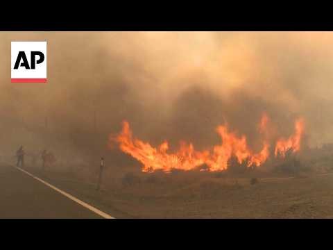 Firefighters battle human-caused wildfire as it rapidly approaches Reno