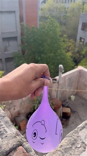 Experiment: Will a water balloon explode when it rolls down from a tall building?💥🎈#satisfying