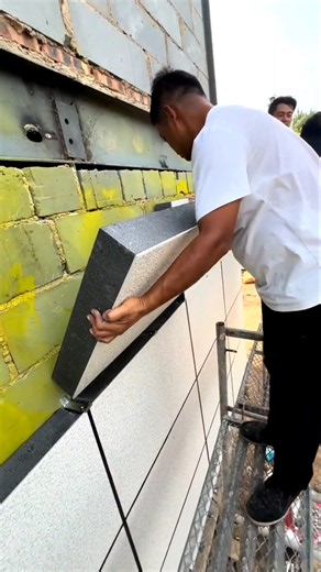 Installing Exterior Insulated Wall Panels on Building