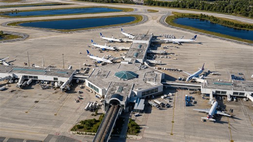 Orlando airport terminal surrounded by runways and aircraft