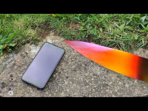PHONE CUT WITH A GLOWING 1000 DEGREE KNIFE! - Experiment
