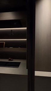 POV: easy to handle pocket doors. A hidden kitchen designed as part of the living room. Compact, functional, and completely concealed behind pocket doors. #inma | INMA