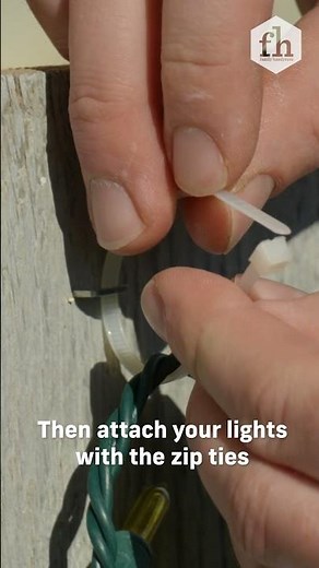 How To Easily Hang Christmas Lights On a Wooden Fence