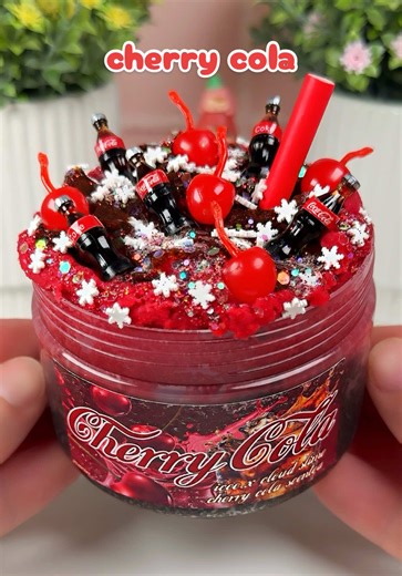 CHERRY COLA 🍒🥤new icee x cloud slime, scented exactly like the name🤤 Inspired by a frozen slushy, such a sizzle and squishy texture. Each slime comes topped with extra col swirl, cherry & coke bottle charms, glitters, snowflake fimos and straw! #slime #asmr #cherry #slimevideo #satisfying