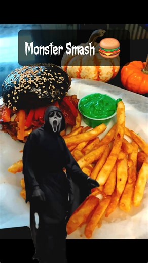This burger didn’t come to play — it came to slay. 💅🔥 #HalloweenEats #MonsterSmash | Delish Cafe East