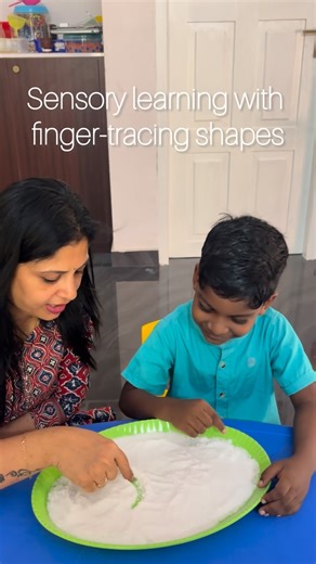 Blossom Grove Preschool on Instagram: "Sensory learning through finger tracing for early shape recognition. Hands-on practice that builds fine motor skills and early writing readiness. Teacher guides, child learns independently — the Montessori way. Pre-School Admissions Open for 2026–2027 Limited seats available | Up to 20% off till 31-12-25 Contact: +91 88910 12361 Location: Althara, Vellayambalam, Trivandrum"