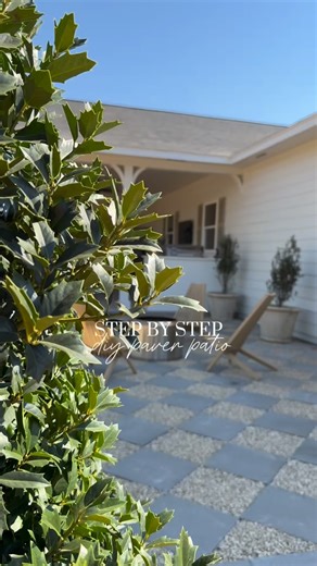 How we created this paver patio: • brought in fill dirt and leveled the ground • brought in 2 inches of crushed granite and compacted it down tightly with a plate compactor — he also used his laser level during all of this to make sure it was staying level • we laid our pavers out using 16x16 squares in a diamond pattern and 16x8 for the outer borders • I wanted a paver and gravel look so we skipped every other paver and then went back and added in drainage rock to those spaces • packed down the