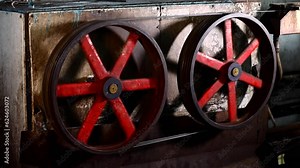 Big spinning shafts with electric wire at a cable manufacturing facility