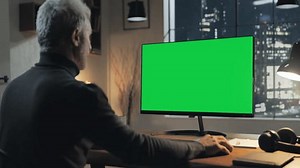 Back View Man Using Computer Green Stock Footage Video (100% Royalty-free) 1101176161 | Shutterstock