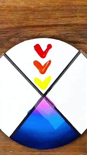 Palette knife blends fiery hues on circular canvas