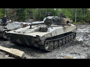 2S1 Gvozdika East German (DDR) Self-propelled Howitzer knee deep in mud