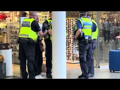 Playing Piano For The Police Arresting A Shoplifter