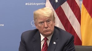 Trump, Merkel praise former President George H.W. Bush