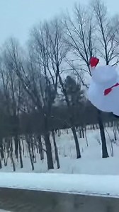 Giant Inflatable Snowman Takes Flight Minneapolis, Minnesota — January 12, 2022 A giant inflatable snowman became the star of an unexpected aerial show this week after it broke free from the back of a pickup truck on a snowy highway. Motorists traveling behind the vehicle captured the moment the festive decoration, which appeared to be tethered to the truck bed, suddenly caught a gust of wind and detached, soaring high into the gray winter sky. The viral footage shows the snowman trailing behind