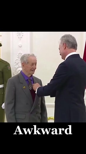 Awkward Handshake Moment with Nauseda