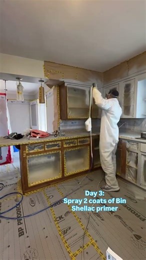 Day 3: spraying 2 coats of BIN shellac primer on this structure. #spray #cabinetpainting