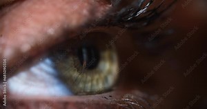 Gray green eye and opening pupil of iris of human eye. Hyperopia myopia astigmatism and laser vision correction concept