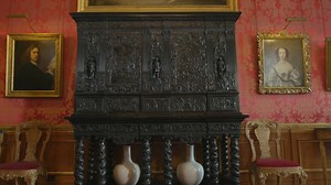 This ebony cabinet is full of secrets. Covered in elaborate low relief carvings, inside it holds chess and backgammon boards, an architectural scene surrounded by watercolours of ruins, and concealed drawers to hide your treasures. Have a look for yourself. | Royal Collection Trust