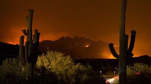 Large wildfires forcing Arizona road closures