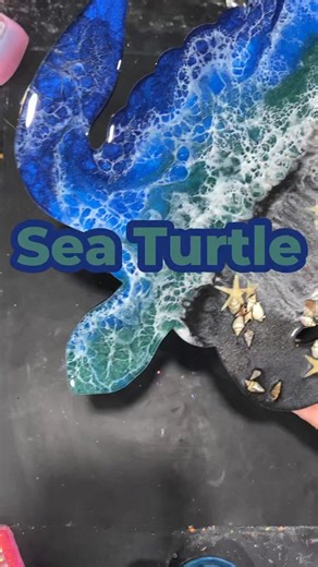 Tabytha Perry on Instagram: "Loving this dark beachy sea turtle 🖤💙 What colors should I do next? #handmade #resin #resinart #letspour #happyplace #loveresin #art #tabscraftroom #hobby #crafting #happycrafting #craftwithme #epoxy #epoxyart #epoxyresinart #epoxylife #smallbusiness #epoxyresin #diy #resinobsession #resinoftiktok #lovinglife #happiness #craftresin #creative #TabulousCreationsCo"
