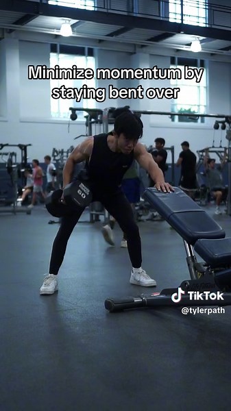 The most common mistake I see on dumbbell bent over rows is people swinging the weights up — usually because of ego. If you have trouble feeling your lats I challenge you to go super strict with the form, bring that elbow back towards your body without any momentum and hold that top position — you’ll feel your lats. #fyp #fitness #gym #bodybuilding