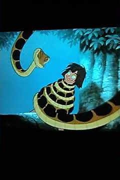 Kaa the snake coils around Mowgli from The Jungle Book hypnosis animated movie edited