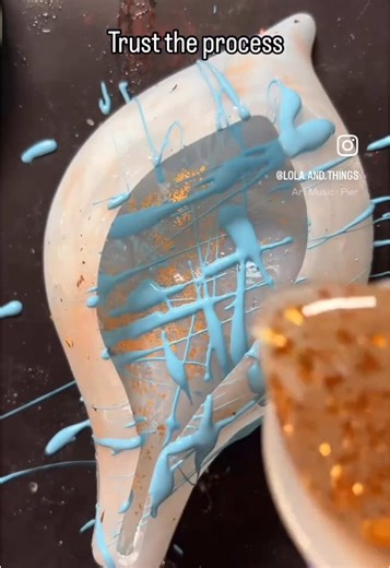 So I still had the crumbles and gold left over in this mold from the failed resincrete and didn’t want to have to scrub and use tape to clean it out. Used @Promise Epoxy resin to fish them out! I tried to be artistic by “splashing and flicking” the paint in there 😅 and I trusted the process lol. Resulted in a hard durable finish! #resinart #resin #resincraft #resinvideo #resinartwork Craft Smart Ocean Breeze acrylic paint