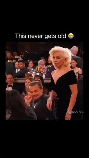 Purely History on Instagram: "At the 2016 Golden Globe Awards, Lady Gaga accidentally brushed past Leonardo DiCaprio while walking to the stage to accept her award. The unexpected contact made DiCaprio flinch and laugh in surprise…"