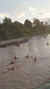 Dozens of people waded and swam across Haiti’s longest river in a desperate bid to flee gang violence. The UN warns that without international assistance, the security situation in the country could reach "a point of no return." | DW News