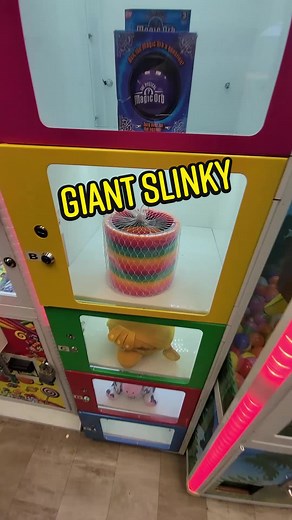 Unboxing Giant Rainbow Slinky from Vending Machine!