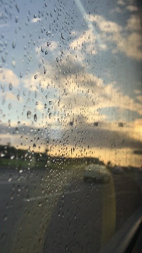 Captivating Rainy Day Window View with Changing Sky