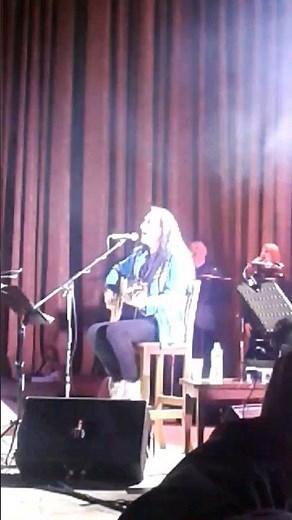 Ken Hensley is singing "Lady in Black" - the most popular hit of Uriah Heep together with the crowd