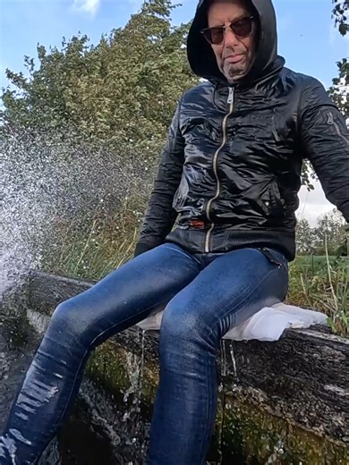 Catching the waves during stormy waethe from a lake nearby in a tight blue Levi's 519. #Wetjeans