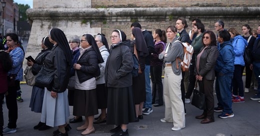 Vatican keeps St. Peter's open all night as hundreds of thousands come to view Pope Francis